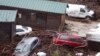 California Flood Sweeps Cabins, Cars Down Coastal Canyon