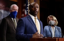FILE - U.S. Senator Tim Scott (R-SC) speaks during a news conference on Capitol Hill in Washington, June 17, 2020.