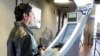 A pedestrian crossing from Mexico into the United States at the Otay Mesa Port of Entry has his facial features and eyes scanned at a biometric kiosk in San Diego, California, Dec. 10, 2015. Senior U.S. administration officials have shed more light on the K-1 visa application process, which has come under scrutiny following this month’s mass shooting in San Bernardino, California.