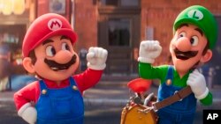 This image released by Nintendo and Universal Studios shows Mario, left, and Luigi in Nintendo's "The Super Mario Bros. Movie." (Nintendo and Universal Studios via AP)