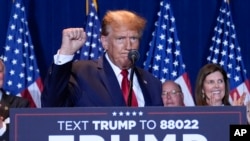 FILE - Republican presidential candidate former President Donald Trump speaks at a primary election night party at the South Carolina State Fairgrounds in Columbia, South Carolina, Feb. 24, 2024. 