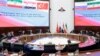 FILE - Negotiators and officials attend a meeting of defense ministers of Russia, Iran, Syria and Turkey in Moscow, Russia, April 25, 2023. The foreign ministers of Turkey and Syria are set to meet May 10, 2023, in Moscow.