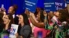 Para perempuan pendukung Demokrat bersorak saat mendengarkan Wakil Presiden Kamala Harris berbicara tentang kebebasan reproduksi di El Rio Neighborhood Center di Tucson, Arizona, 12 April 2024.
