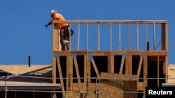 New contemporary attached residential homes are shown under construction by Beazer Homes USA Inc. in Vista, California, U.S., Oct. 24, 2023. 