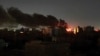 Asap mengepul di cakrawala saat api berkobar setelah serangan di Khartoum, Sudan, 16 April 2023. (Foto: AP)
