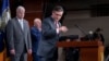 Republican House Speaker Mike Johnson, joined from left by Majority Whip Tom Emmer and Majority Leader Steve Scalise, departs after meeting with reporters at the Capitol in Washington, Feb. 14, 2024.