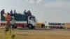 FILE - People displaced from Sudan's Jazira state arrive in packed vehicles to the entrance of the eastern city of Gedaref on June 10, 2024, amid the ongoing conflict between the Sudanese army and the paramilitary Rapid Support Forces (RSF). 