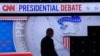 U.S. President Joe Biden walks during a break as he participates in a presidential debate in Atlanta, Georgia, June 27, 2024.