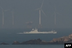A Chinese landing ship sails towards the zone where China said it would conduct live fire exercises northeast of Pingtan island, the closest point in China to Taiwan, in China's southeast Fujian province on April 10, 2023.