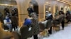FILE- Beauticians put makeup on customers at Ms. Sadat's Beauty Salon in Kabul, Afghanistan, April 25, 2021. A spokesman at Afghanistan's Vice and Virtue Ministry said July 4, 2023, the Taliban are banning women's beauty salons. 