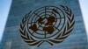 FILE - The symbol of the United Nations is displayed outside the Secretariat Building, Feb. 28, 2022, at United Nations Headquarters. The U.N. has been working on a global cybercrime treaty but there are concerns about the treaty's broad language. 
