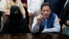 Pakistani court suspends sentence for ex-PM Khan, wife in a graft case but couple won't be freed