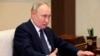 Presiden Rusia Vladimir Putin berbicara dalam sebuah pertemuan di Novo-Ogaryovo di luar Kota Moskow, Rusia, pada 3 Mei 2023. (Foto: Mikhail Klimentyev, Sputnik, Kremlin Pool Photo via AP)