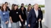 German Chancellor Olaf Scholz, leaves the terrace of the Chancellery with participants after a group picture during an event marking Girls' Day at the Chancellery in Berlin, April 23, 2024. 