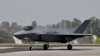 FILE - A U.S. Air Force F-35 fighter jet taxis at Yelahanka air base in Bengaluru, India, Feb. 13, 2023. The U.S. Air Force plans to upgrade more than 80 fighter jets stationed at Japanese bases over the next several years; the upgrade includes advanced F-35 jets.