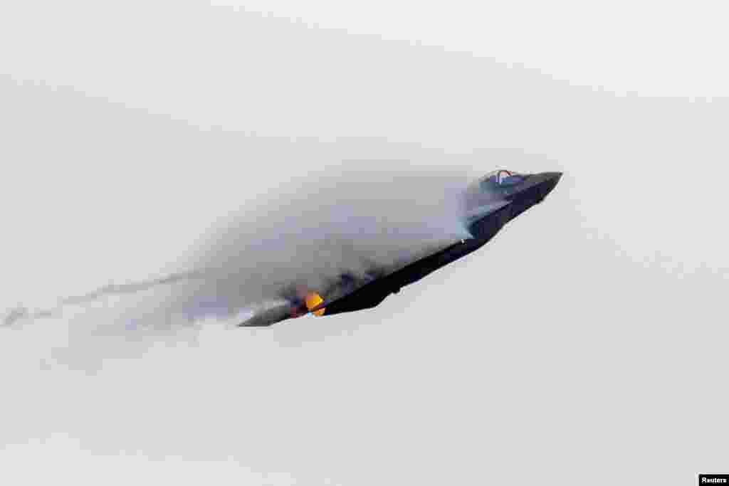 A Lockheed Martin F-35 fighter jet performs during the International Aerospace Exhibition ILA on the opening day at Schoenefeld Airport in Berlin, Germany.