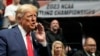 Former President Donald J. Trump watches the NCAA Wrestling Championships, March 18, 2023, in Tulsa, Okla. (