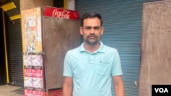 Driver Jitender Singh Chandel is struggling to find a job. But he will vote for BJP because he says security has improved under Modi's decade in power. (Anjana Pasricha/VOA)