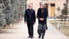 Abdullah Abdullah, left, and Hamid Karzai have remained in Kabul, Afghanistan, since the Taliban seized power.