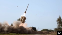 A missile is launched during a drill in Iran in this picture released Jan. 19, 2024. The U.S. and allies are warning Iran that it will face new sanctions if it moves forward with a plan to supply ballistic missiles to Russia. (Iranian army via AP)