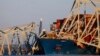 Crews start to remove steel from collapsed bridge in US