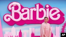 Writer/director/executive producer Greta Gerwig poses for photographers upon arrival at the premiere of the film 'Barbie' in London, Britain, July 12, 2023. (Scott Garfitt/Invision/AP)