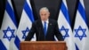 Israeli Prime Minister Benjamin Netanyahu speaks to the media during a press conference, in Tel Aviv, Israel, April 10, 2023.