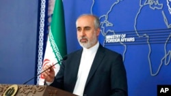 FILE - Iranian Foreign Ministry spokesperson Nasser Kanaani speaks in Tehran, Iran, in this Aug. 11, 2022, photo released by the Iranian Foreign Ministry.