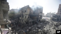 Kamp Pengungsi Nuseirat di Jalur Gaza tampak hancur, dan sedikitnya 274 orang tewas, pasca pemboman Israel yang dilakukan dalam operasi pembebasan sandera, 8 Juni 2024. 