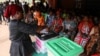 A voter casts her ballot during Nigeria's Presidential election, in Agulu, Anambra state, Nigeria, Feb. 25, 2023.