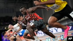 FILE - Ferdinand Omanyala, of Kenya, starts in his men's 60 meters heat during the World Athletics Indoor Championships at the Emirates Arena in Glasgow, Scotland, March 1, 2024.