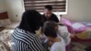 Malbata Duhokî ya ji Almanya Dersînorkirî, Banga Alîkarîyê Dike