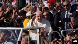 Pope Francis arrives at Lisbon's Parque Eduardo VII to preside over a "Via Crucis" (Way of the Cross) with young people participating into Sunday's 37th World Youth Day in the Portuguese capital, Aug. 4, 2023.