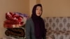 FILE - Gulbahar Jelilova, an ethnic Uyghur activist from Kazakhstan, is pictured in Istanbul, Turkey, Nov. 16, 2018. Jelilova recently was relocated in Paris after attempted encounters by suspected Chinese nationals.