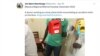 A Twitter screenshot of a medical worker standing as a back drop stand resuscitating a patient on the floor. 