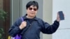 李解新被指街头演奏《愿荣光归香港》，被法庭裁定7项无牌演奏等传票控罪成立，判监30日，获准保释等候上诉 (美国之音/汤惠芸)