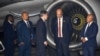 Papua New Guinea's Deputy Prime minister John Rosso (2R) greets US Secretary of State Antony Blinken (C) upon his arrival at Port Moresby International Airport, New Guinea, May 21, 2023.