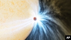 This illustration provided by Caltech/IPAC by depicts a planet skimming the surface of its star. Astronomers reported their observations Wednesday, May 3, 2023.(K. Miller, R. Hurt/Caltech/IPAC via AP)