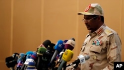 FILE - Gen. Mohammed Hamdan Dagalo, the deputy head of the military council speaks at a ceremony in Khartoum, Aug. 4, 2019. Sudan's government said it will send a delegation to Cairo for discussions with U.S. and Egyptian officials on Monday, 