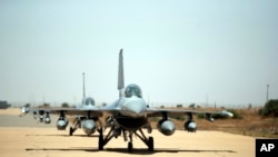 American F16 fighter jets land in an airbase for the African Lion military exercise, in Ben Guerir, Morocco, Monday, June 14, 2021.