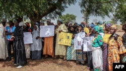 NIGERIA-UNREST-BOKO HARAM-KIDNAPPING-CHINOK (Photo by Audu Ali MARTE / AFP)