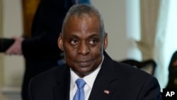Defense Secretary Lloyd Austin attends a meeting with NATO Secretary General Jens Stoltenberg (not pictured) at the Pentagon, near Washington, Jan. 29, 2024. 