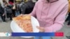 Ante el alza de la inflación, la pizza va al rescate de los bolsillos de los neoyorkinos