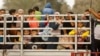 Palestinians flee north Gaza to move southward, as Israeli tanks roll deeper into the enclave, amid the ongoing conflict between Israel and Hamas, in the central Gaza Strip, Nov. 12, 2023.