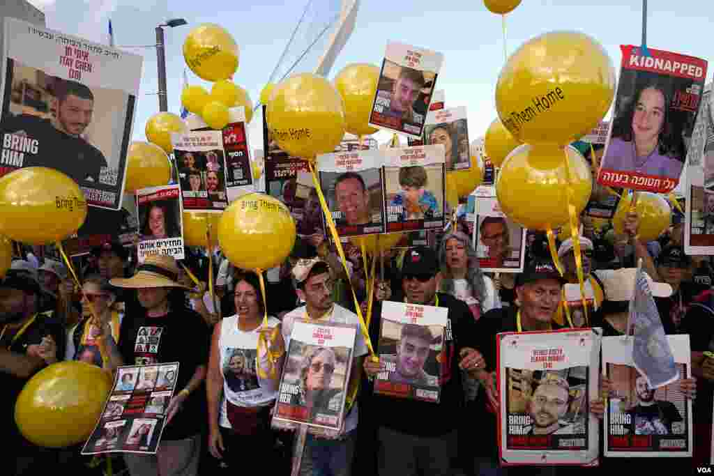 Si hay que devolver a los miles de presos palestinos que tenemos aquí (en Israel), que los devuelvan, dice una de las personas que participan en la marcha. 