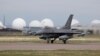 FILE - A F-16 Fighting Falcon from Colorado Air National Guard's 140th Wing takes off from Buckley Air Force Base as part of a second flyover to salute COVID-19 front line workers, May 15, 2020, in Aurora, Colo. 