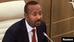 FILE - Ethiopian Prime Minister Abiy Ahmed speaks in parliament in Addis Ababa, Ethiopia, July 4, 2024. He said on Friday that the federal government has been reaching out to rebels in the Amhara region in an effort to resolve the ongoing conflict there.