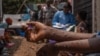 A patient suffering from mpox sits on a bench at the Kavumu hospital, 30 km north of Bukavu in eastern Democratic Republic of Congo, Aug. 24, 2024. 