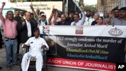 Journalists hold a demonstration to condemn the killing of senior Pakistani journalist Arshad Sharif by Kenyan police, in Karachi, Pakistan, Oct. 24, 2022.
