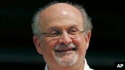FILE - Author Salman Rushdie appears during the Mississippi Book Festival in Jackson, Miss., on Aug. 18, 2018.